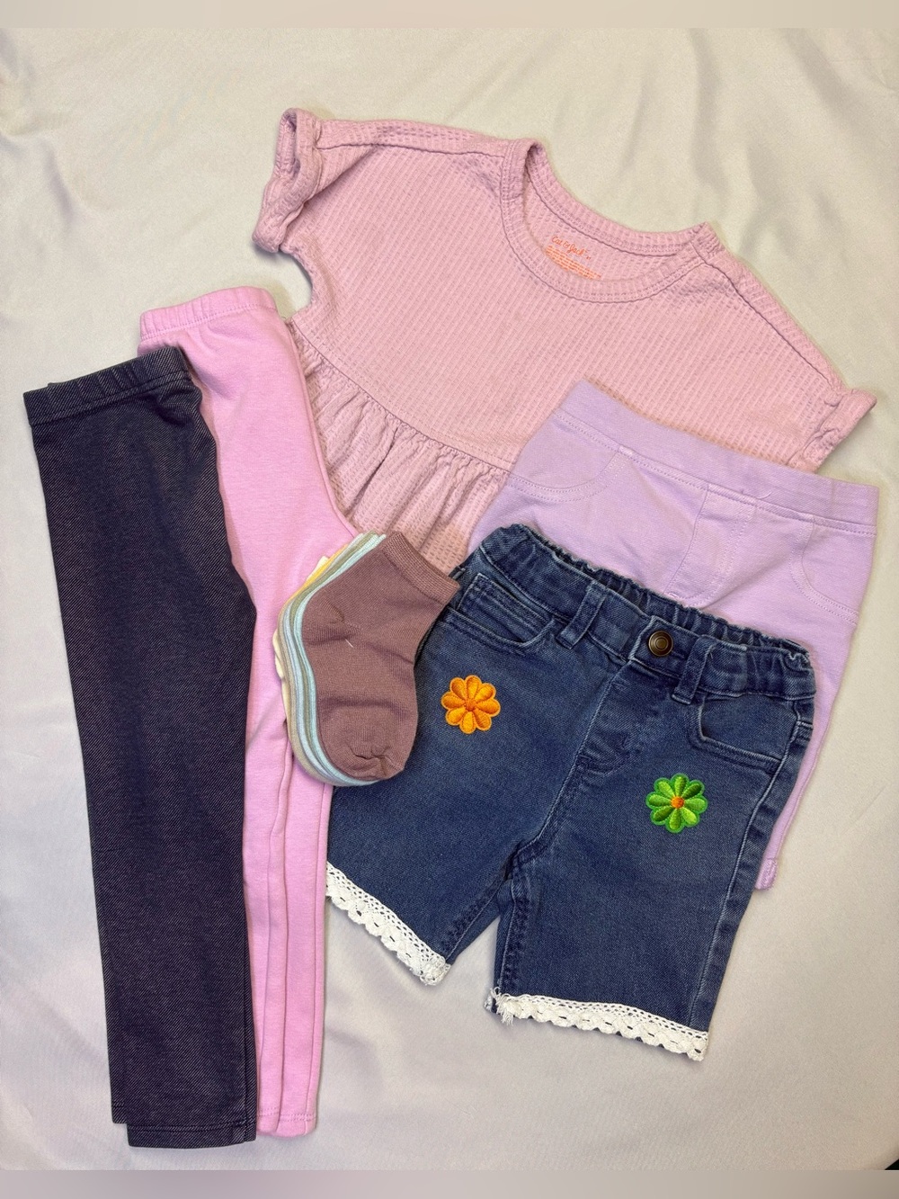 Bundle girl pair of pants shorts shirt and socks